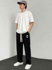 Kotty Men Solid Mid-Rise Relaxed Relaxed Fit Regular Trousers