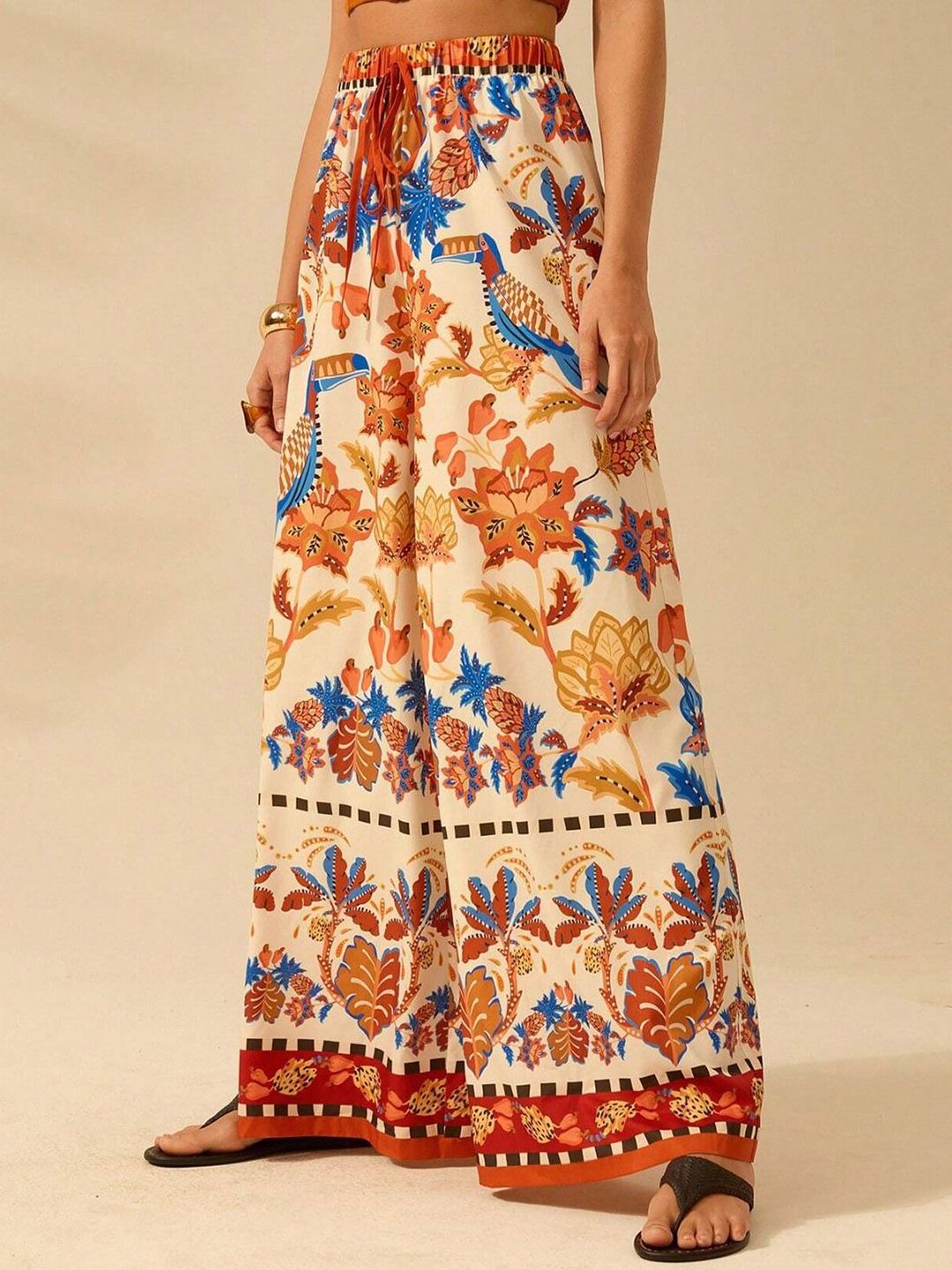 Kotty Women Floral Printed Comfort Flared High-Rise Regular Trousers