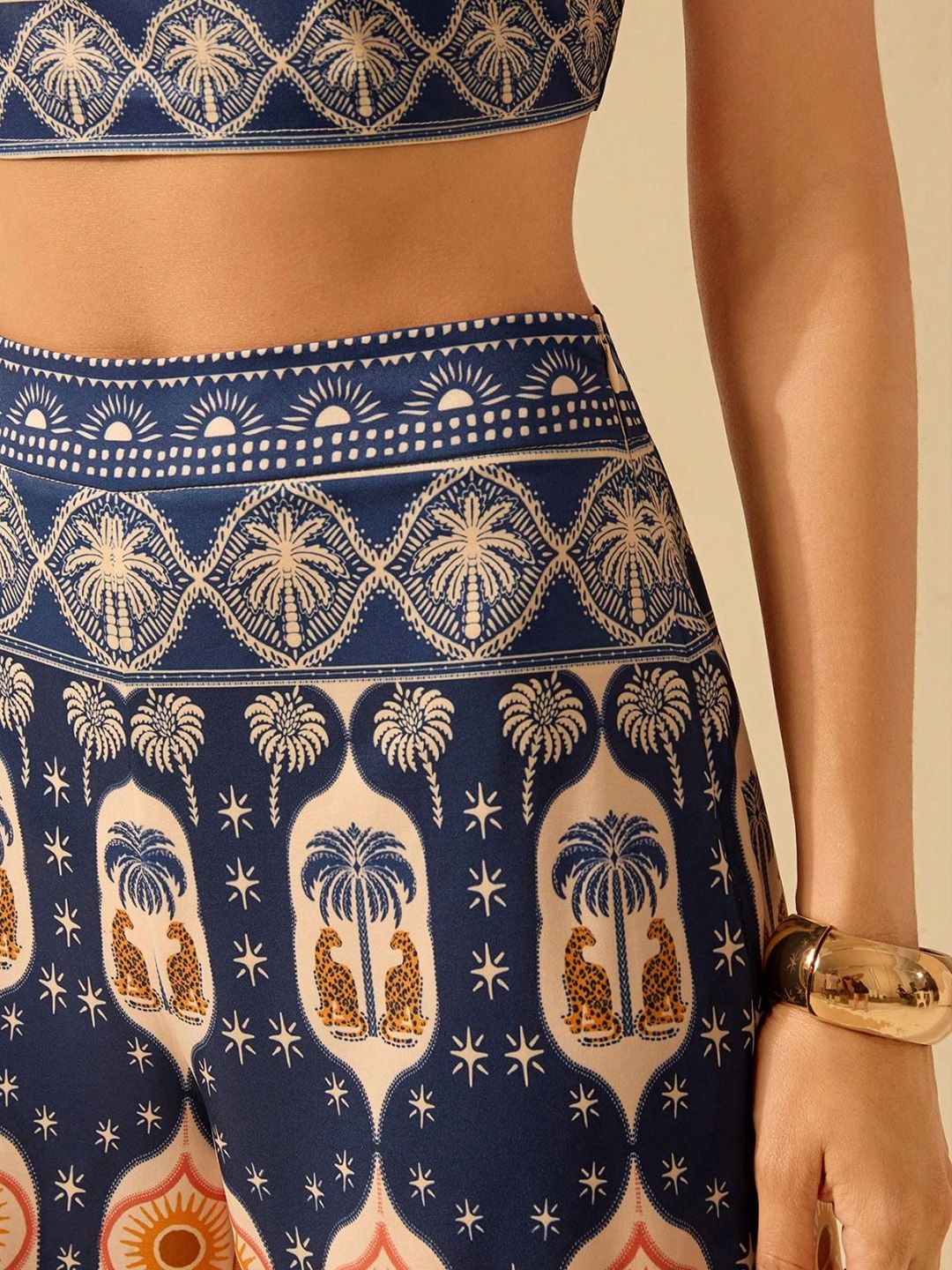 Kotty Women Ethnic Motifs Printed Relaxed Flared High-Rise Trousers