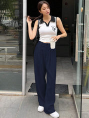 Kotty Women Relaxed Straight Leg High-Rise Pleated Trousers