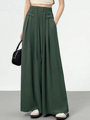 Kotty Women Loose Fit High-Rise Pleated Cotton Trousers