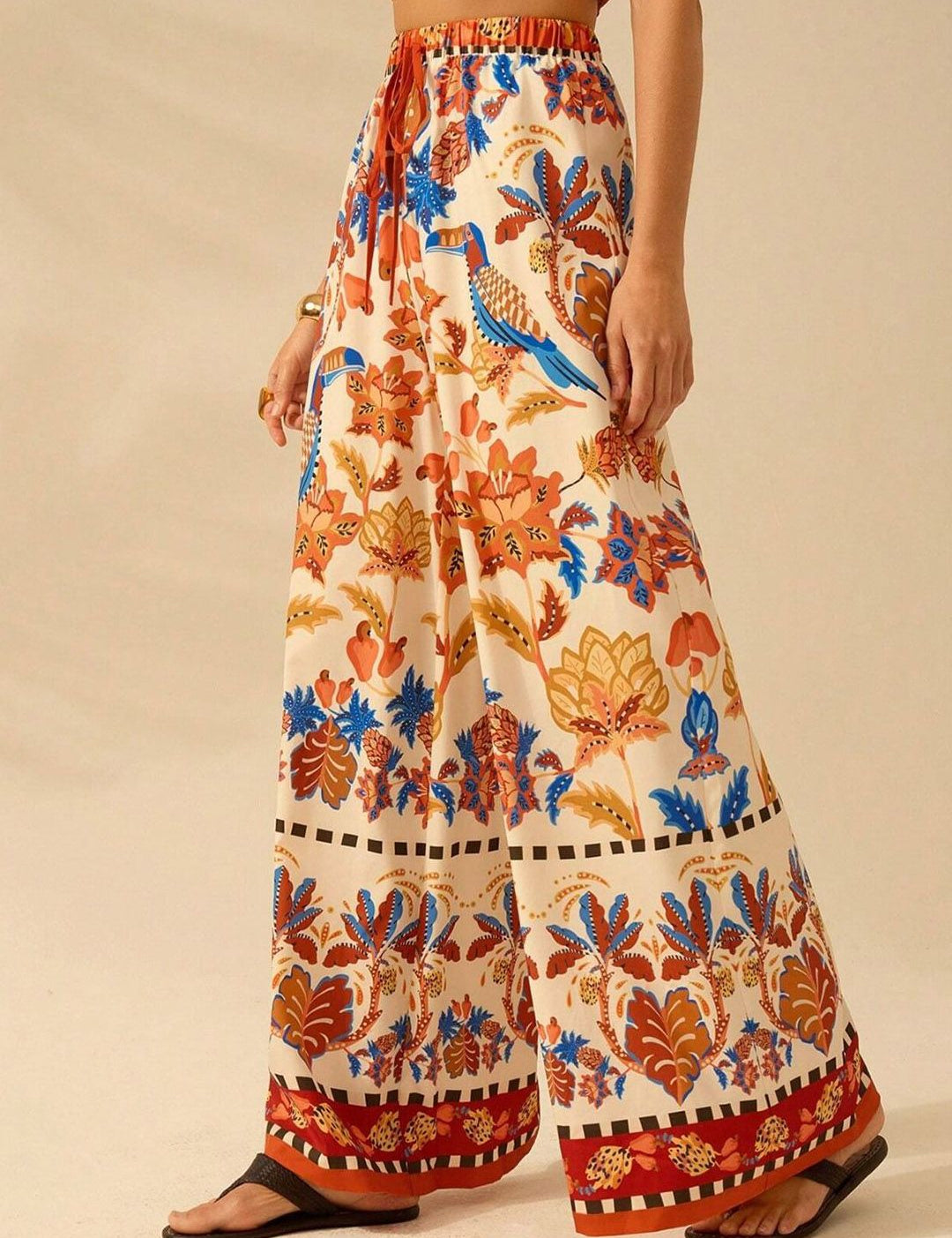 Kotty Women Floral Printed Comfort Flared High-Rise Regular Trousers