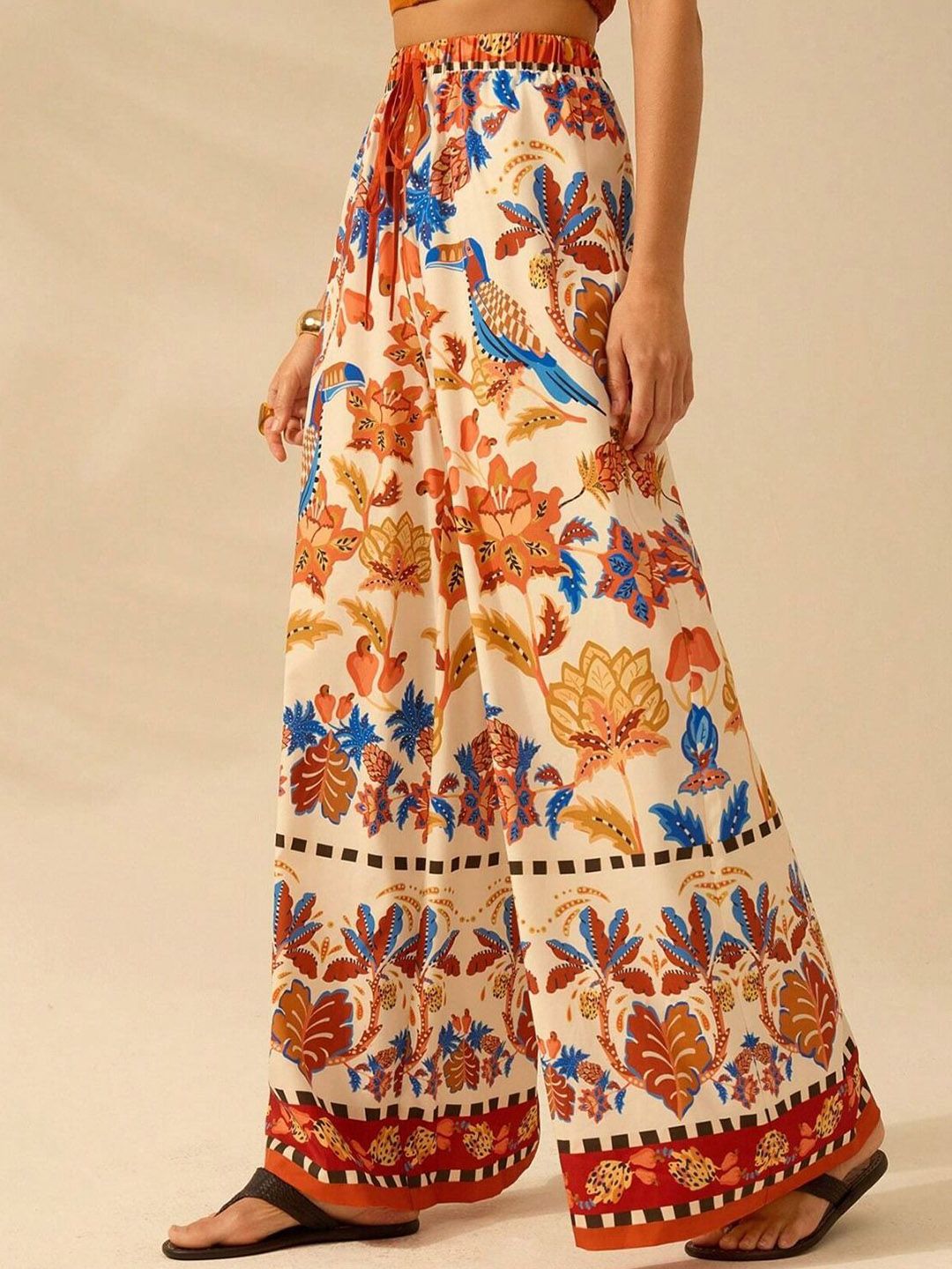 Kotty Women Floral Printed Comfort Flared High-Rise Regular Trousers