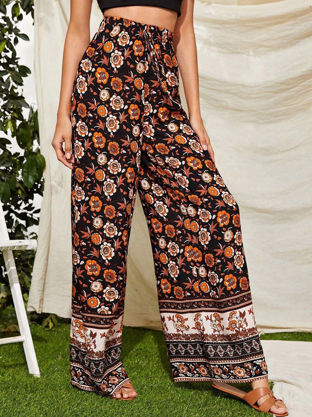 Kotty Women Black Floral Printed Relaxed Flared High-Rise Easy Wash Trousers