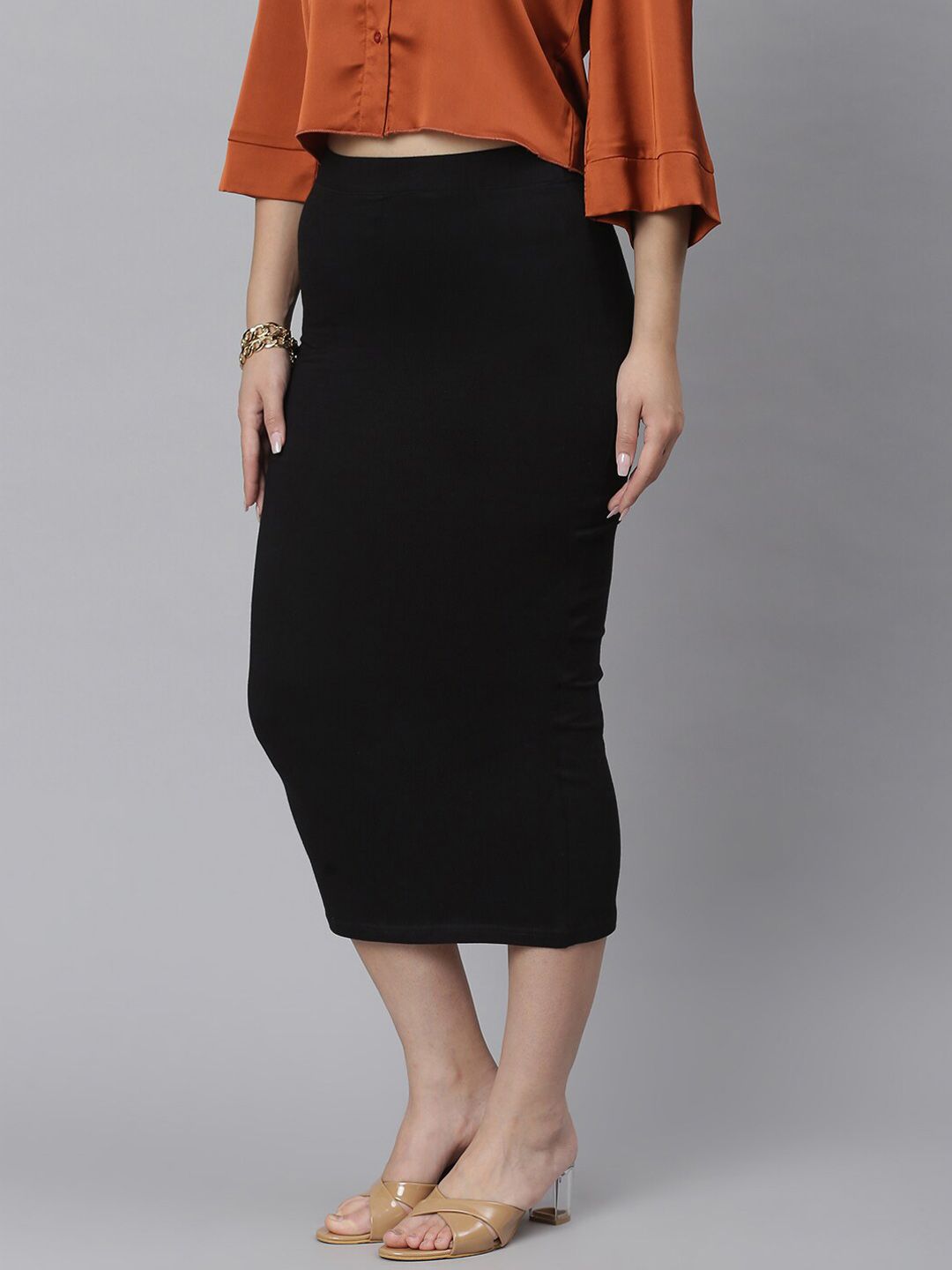 Kotty Women Black Solid Midi Pencil Skirt