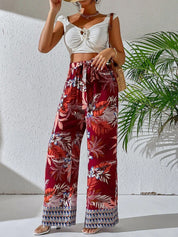 Kotty Women Maroon Floral Printed Relaxed Straight Fit High-Rise Easy Wash Trousers