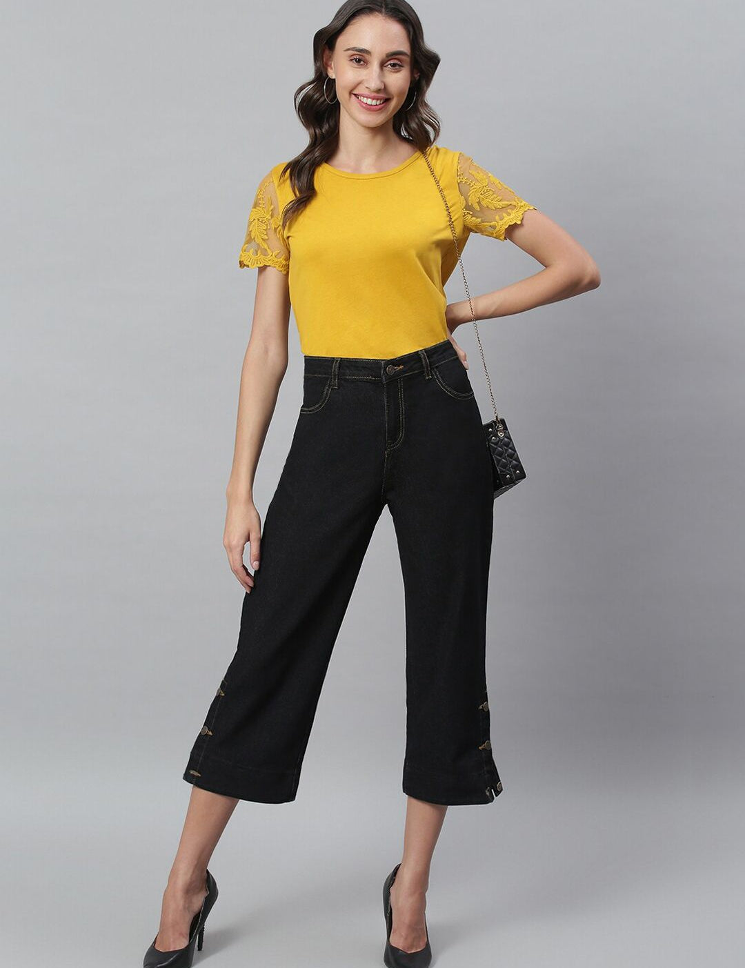 Kotty Women Black Solid Cotton High-Rise Crop Flared Jeans