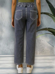 Kotty Women Straight Fit High-Rise Highly Distressed Light Fade Stretchable Jeans