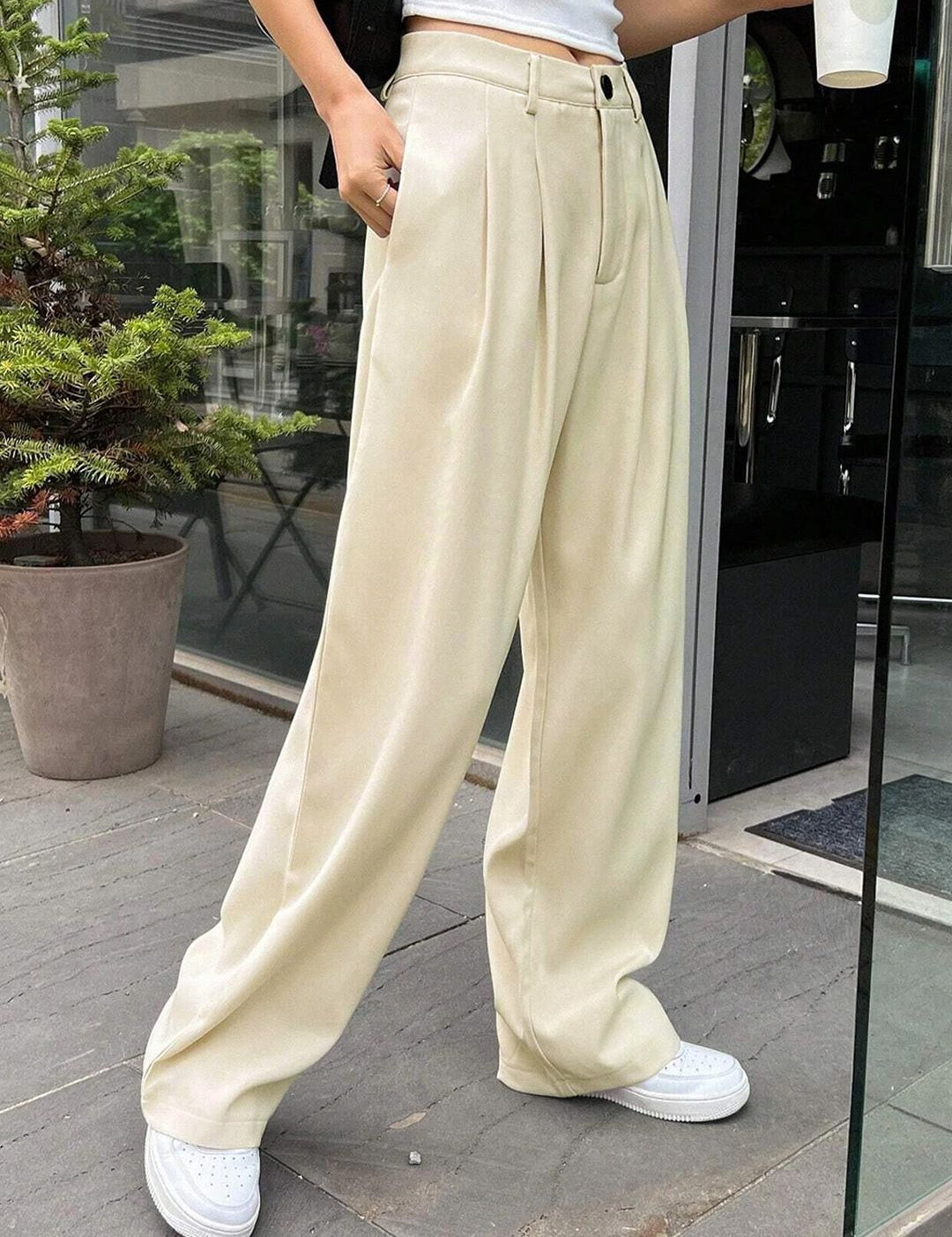 KOTTY BIZwear Women Beige Relaxed Straight Leg Straight Fit High-Rise Easy Wash Pleated Trousers