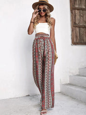 Kotty Women Brown Printed Relaxed High-Rise Easy Wash Pleated Trousers