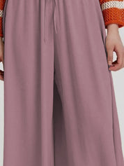 Kotty Women Relaxed Fit High-Rise Wide Leg Trousers
