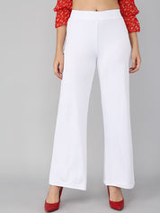 Kotty Women White Solid Flared Fit Parallel Trousers