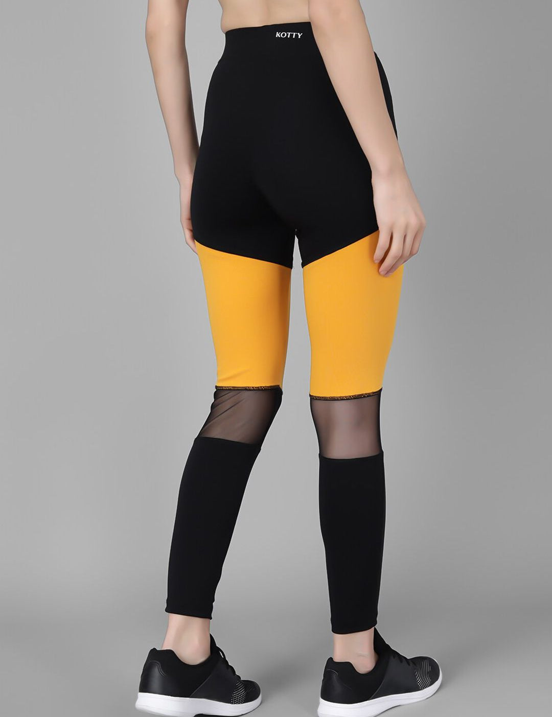 Kotty Women Black & Yellow Colourblocked Tights