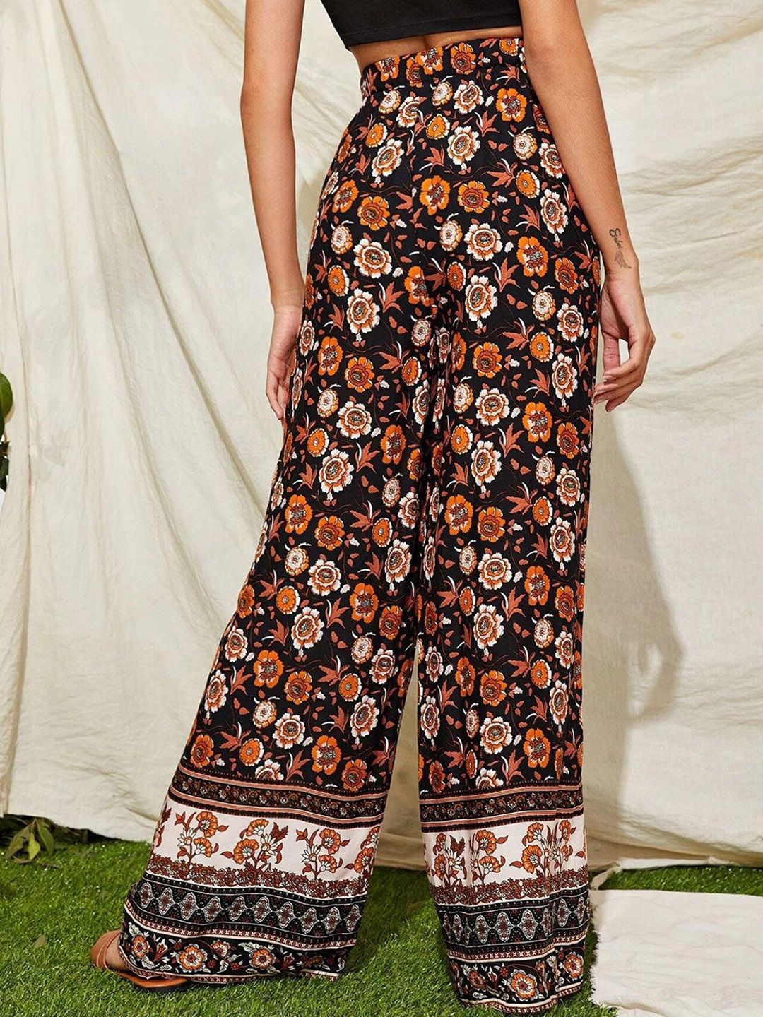 Kotty Women Black Floral Printed Relaxed Flared High-Rise Easy Wash Trousers