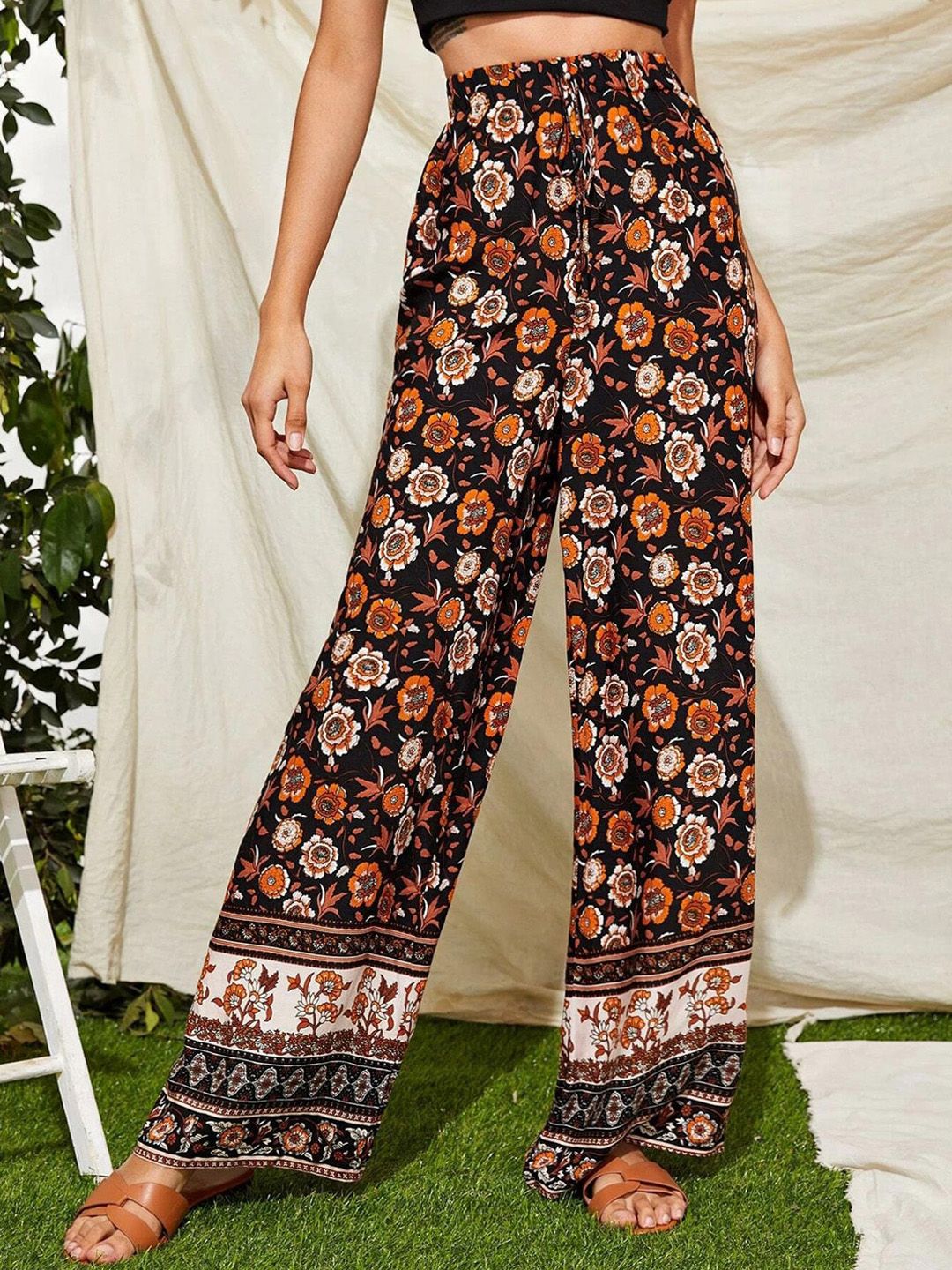 Kotty Women Black Floral Printed Relaxed Flared High-Rise Easy Wash Trousers