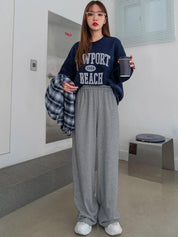 Kotty Women Straight Fit Mid-Rise Track Pants