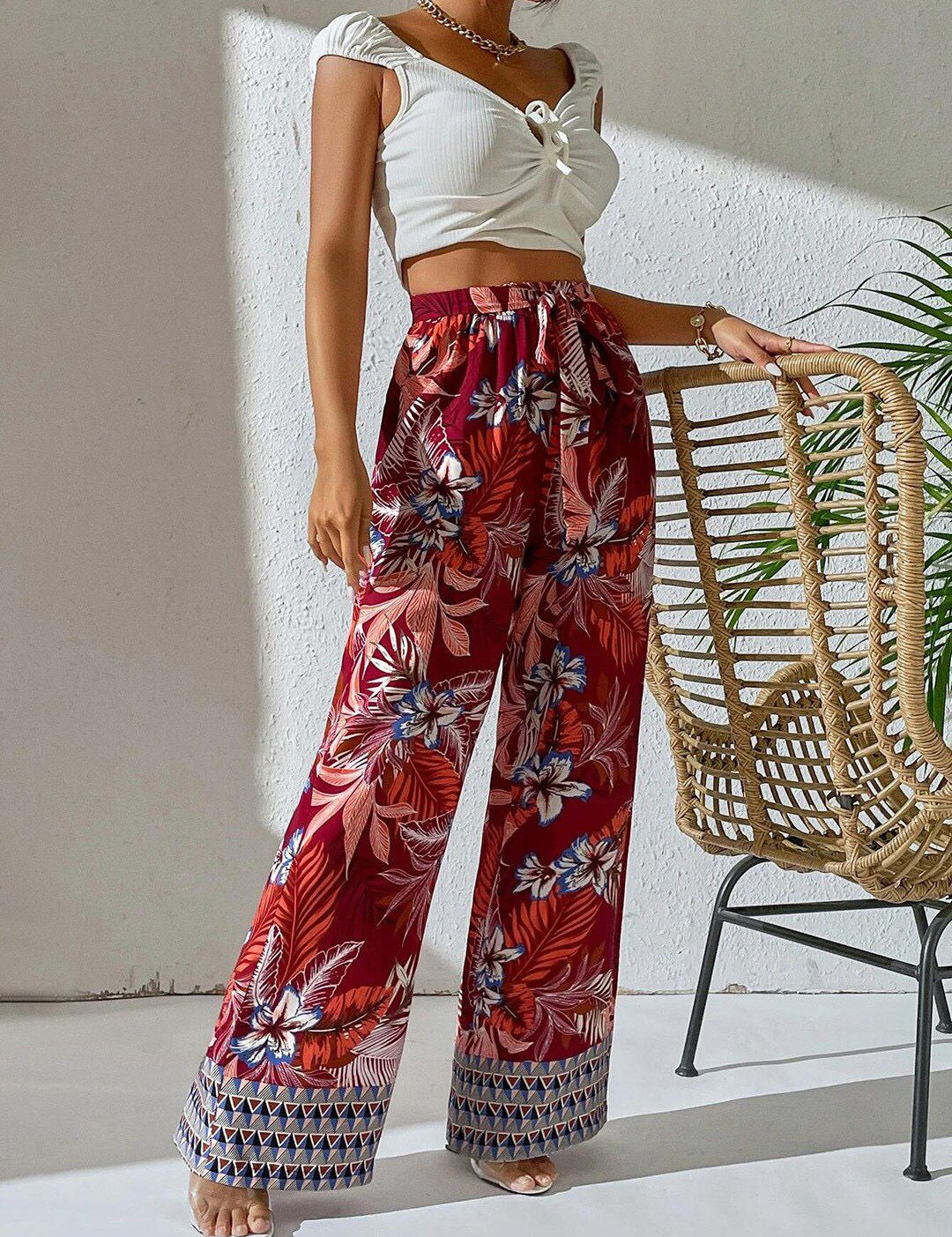 Kotty Women Maroon Floral Printed Relaxed Straight Fit High-Rise Easy Wash Trousers