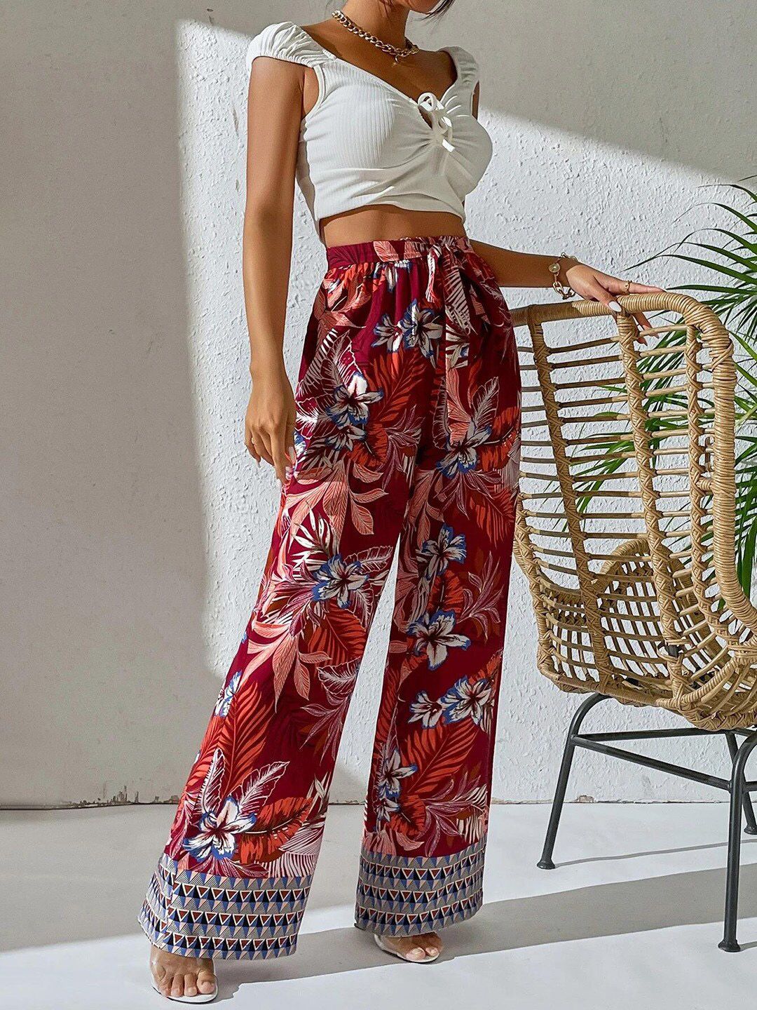 Kotty Women Maroon Floral Printed Relaxed Straight Fit High-Rise Easy Wash Trousers