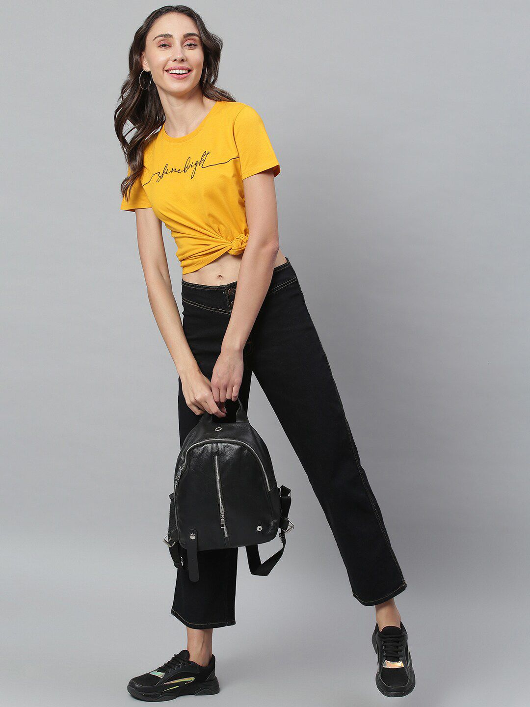 Kotty Women Black Flared High-Rise Clean Look Jeans