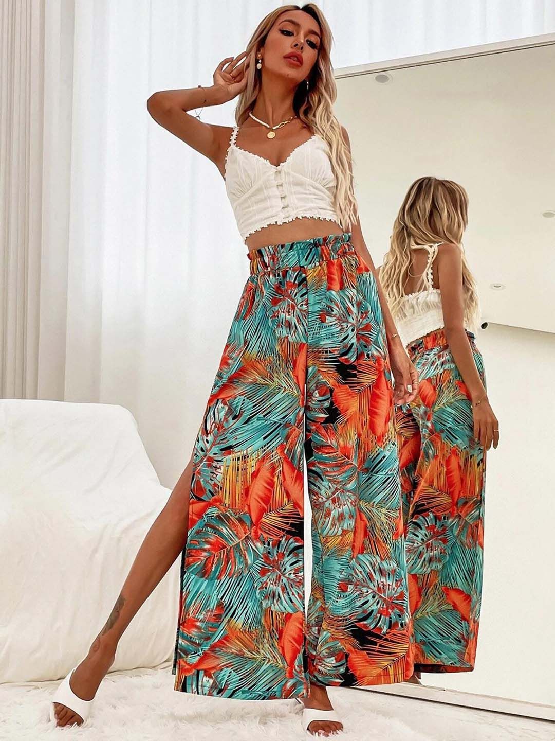Kotty Women Teal Floral Printed Relaxed Flared High-Rise Easy Wash Pleated Trousers