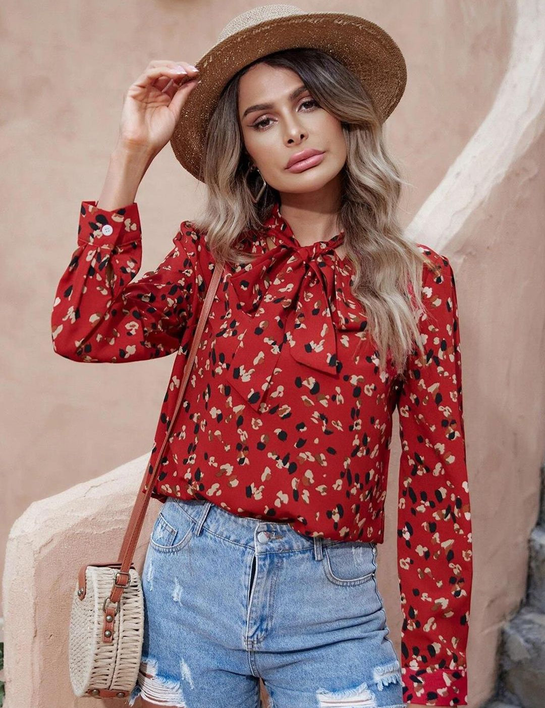 Kotty Red Abstract Printed Tie-Up Neck Regular Top