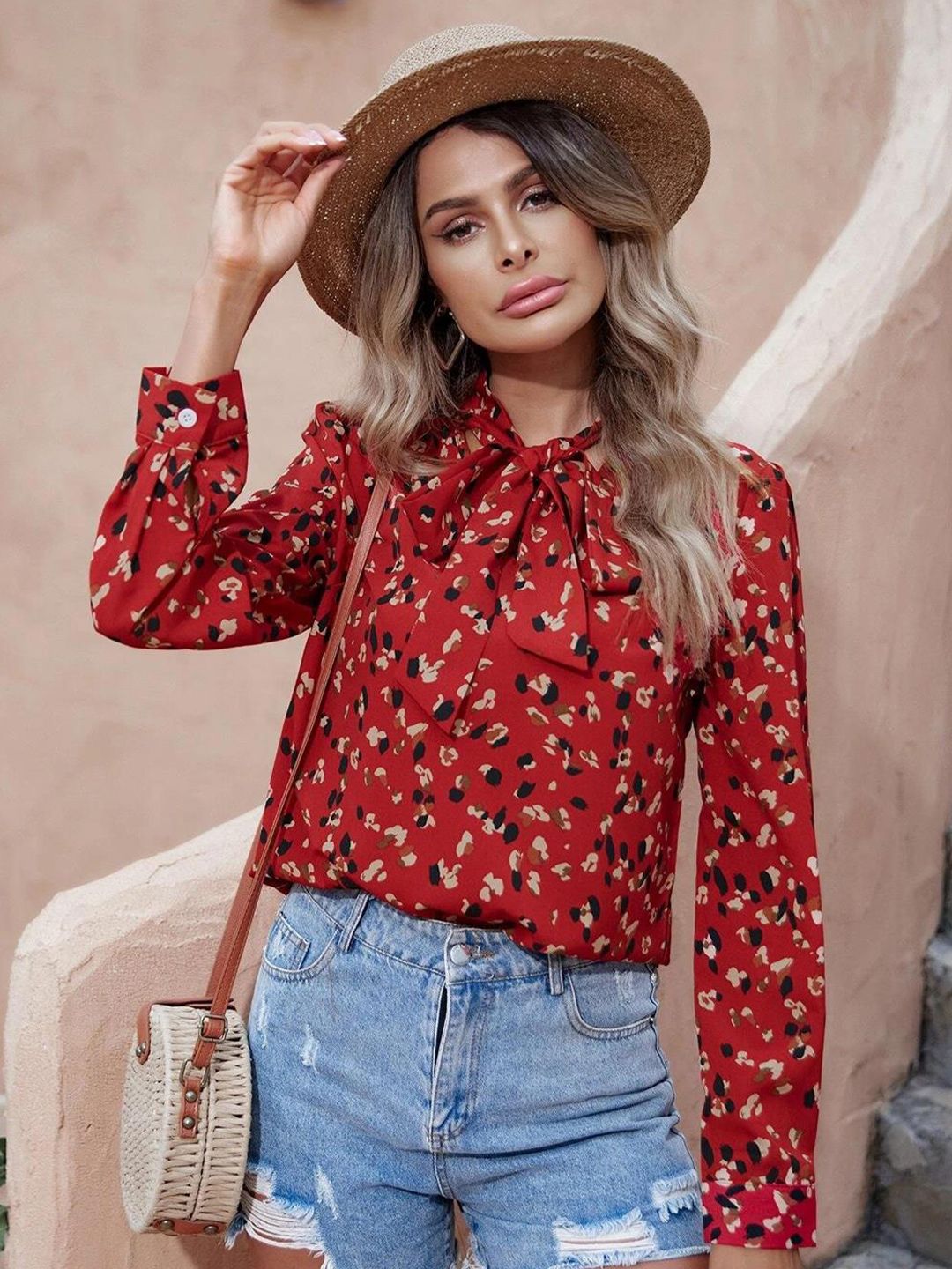 Kotty Red Abstract Printed Tie-Up Neck Regular Top