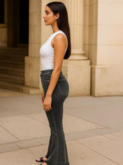 Kotty Women Flared Fit High-Rise Mildly Distressed Stretchable Jeans