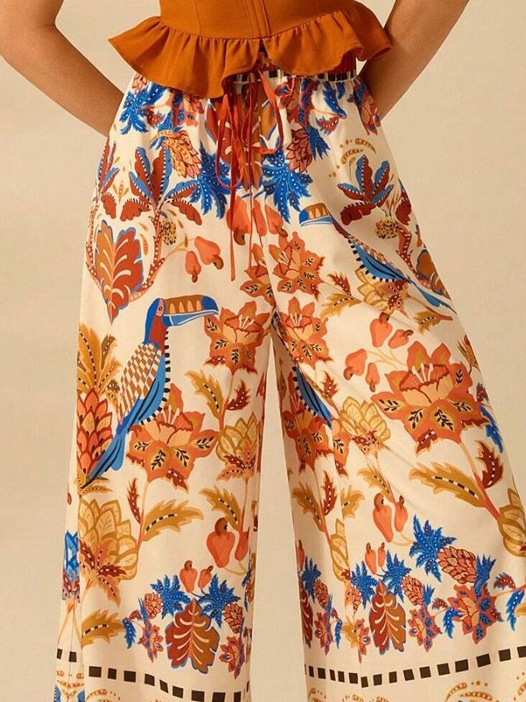 Kotty Women Floral Printed Comfort Flared High-Rise Regular Trousers