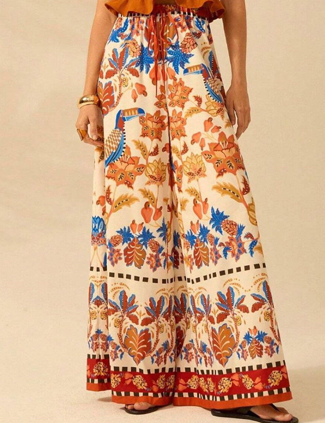 Kotty Women Floral Printed Comfort Flared High-Rise Regular Trousers