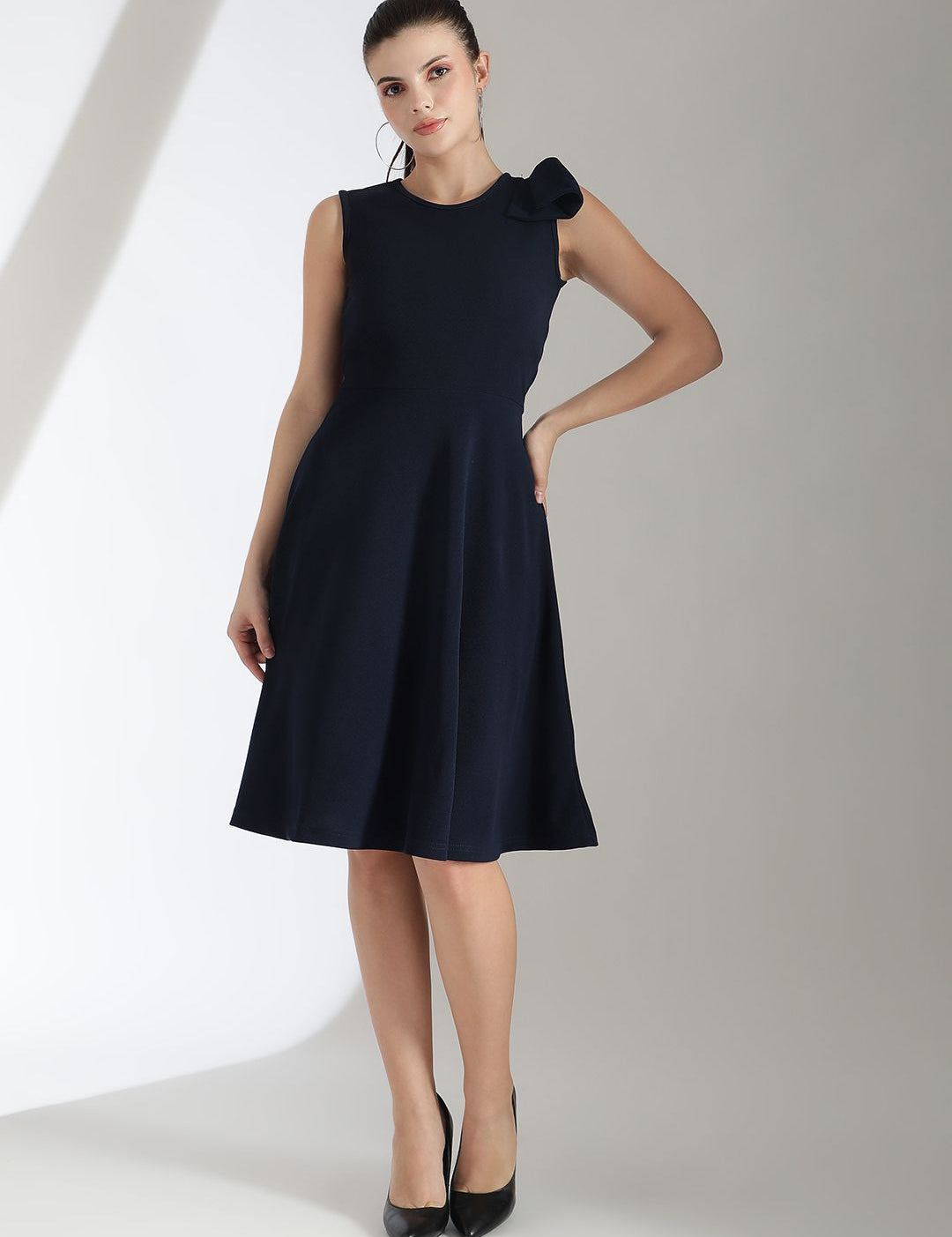 Kotty Solid Round Neck Bow Detailed Fit & Flare Dress