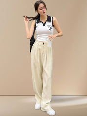 Kotty Women Textured Straight Fit High-Rise Pleated Trousers