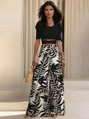 Kotty Women Floral Printed Relaxed Flared High-Rise Easy Wash Trousers