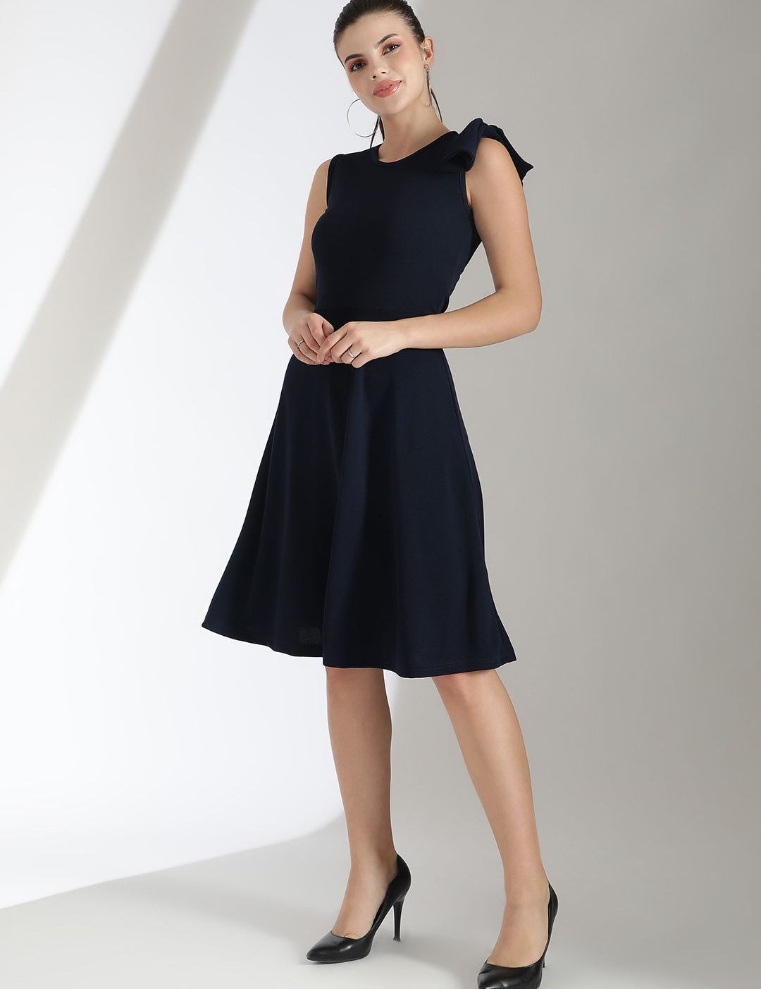 Kotty Solid Round Neck Bow Detailed Fit & Flare Dress