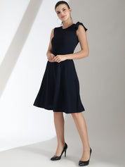Kotty Solid Round Neck Bow Detailed Fit & Flare Dress