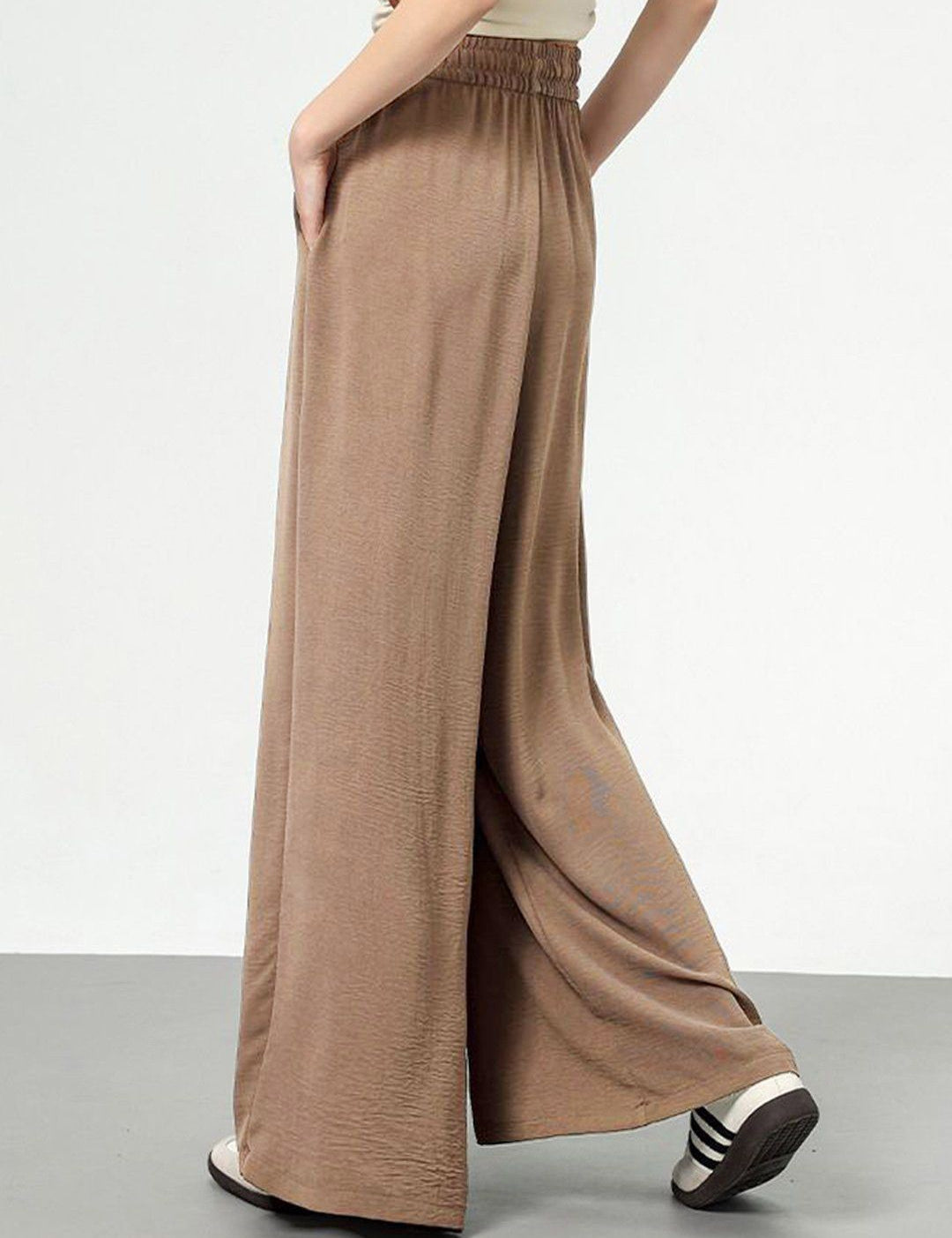 Kotty Women Textured Flared High-Rise Trouser