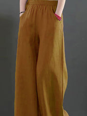 Kotty Women Loose Fit High-Rise Trousers