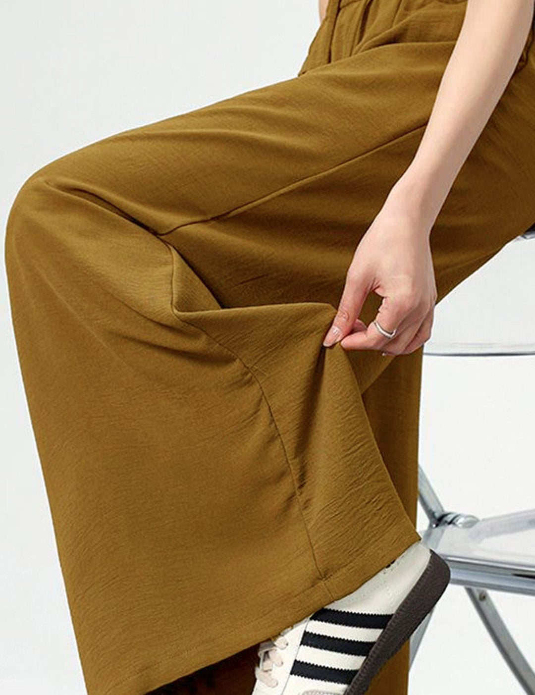 Kotty Women Loose Fit High-Rise Solid Breathable Easy Wash Pleated Crumble Trousers