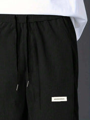 Kotty Men Relaxed High-Rise Corduroy Joggers Trousers