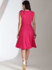 Kotty Solid Round Neck Bow Detailed Fit & Flare Dress