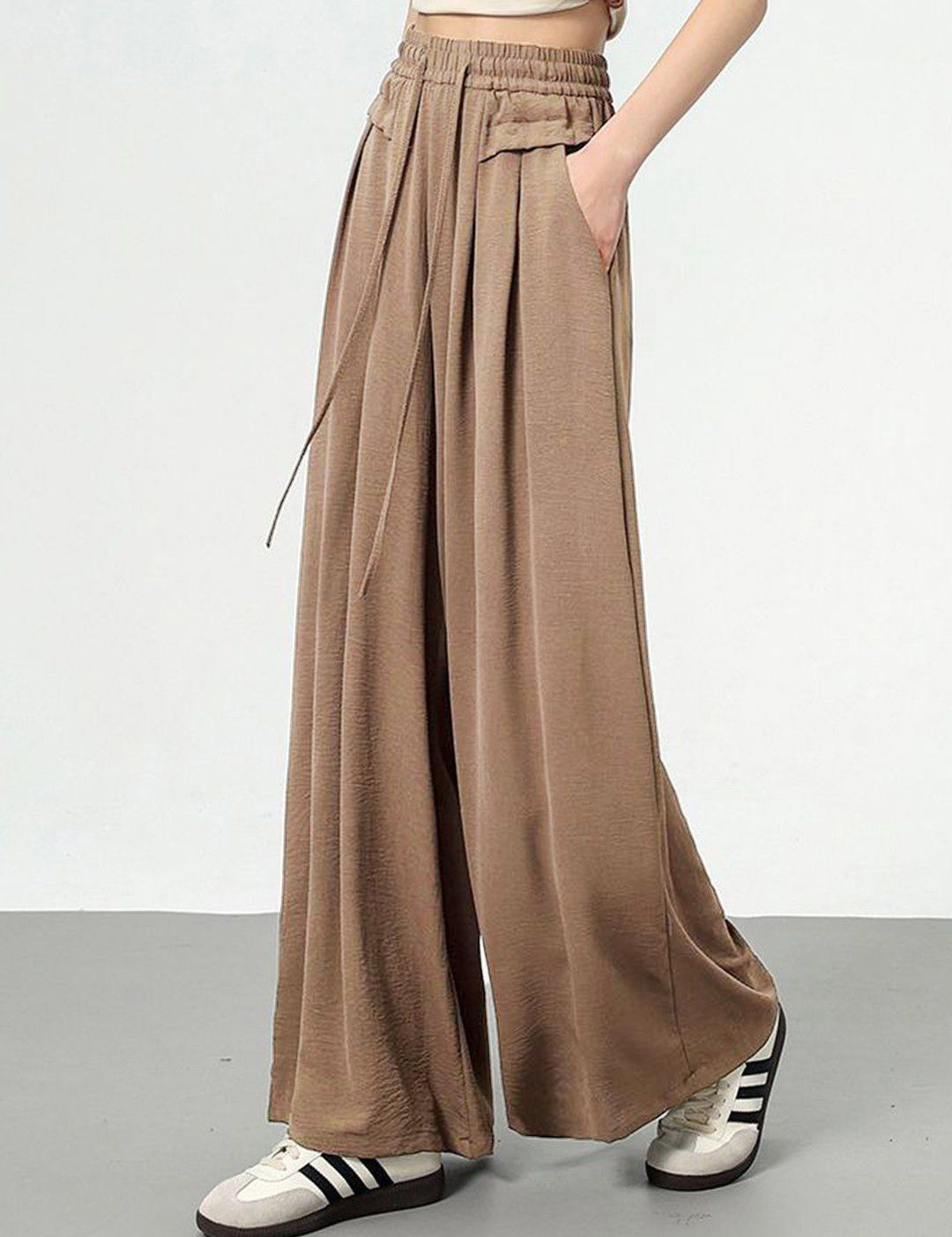 Kotty Women Textured Flared High-Rise Trouser