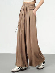 Kotty Women Textured Flared High-Rise Trouser