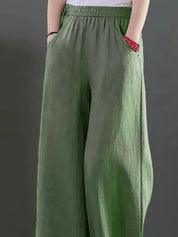 Kotty Women Loose Fit High-Rise Wide-Leg Trousers