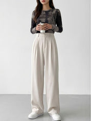White Relaxed Fit High-Rise Trousers for Women | Kotty