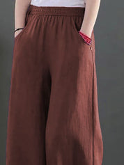 Kotty Women Loose Fit High-Rise Trousers