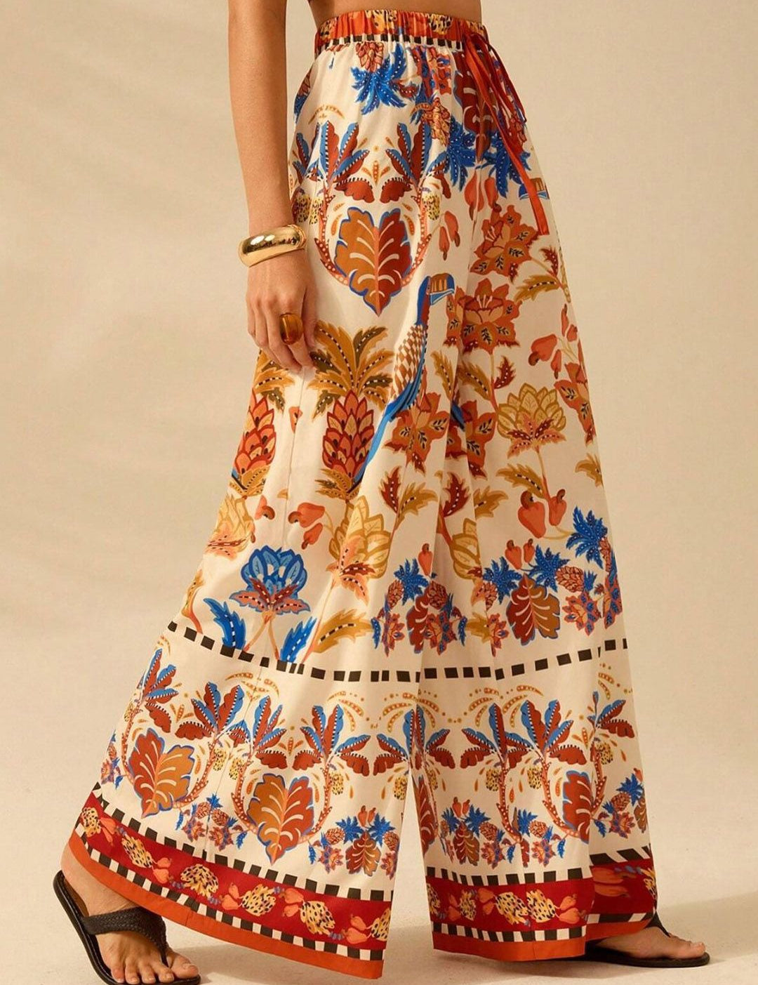 Kotty Women Floral Printed Comfort Flared High-Rise Regular Trousers