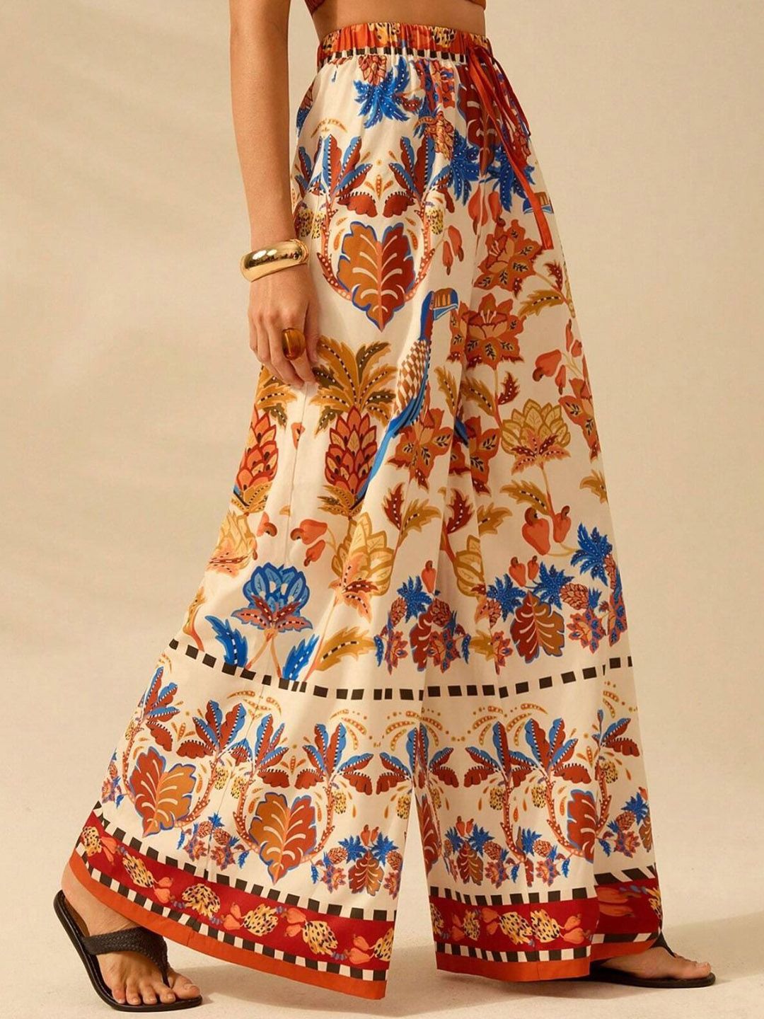 Kotty Women Floral Printed Comfort Flared High-Rise Regular Trousers