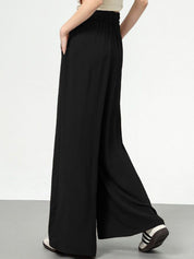 Kotty Women Loose Fit High-Rise Easy Wash Pleated Trousers